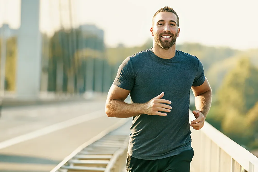 who-is-a-good-fit a man running on a bridge