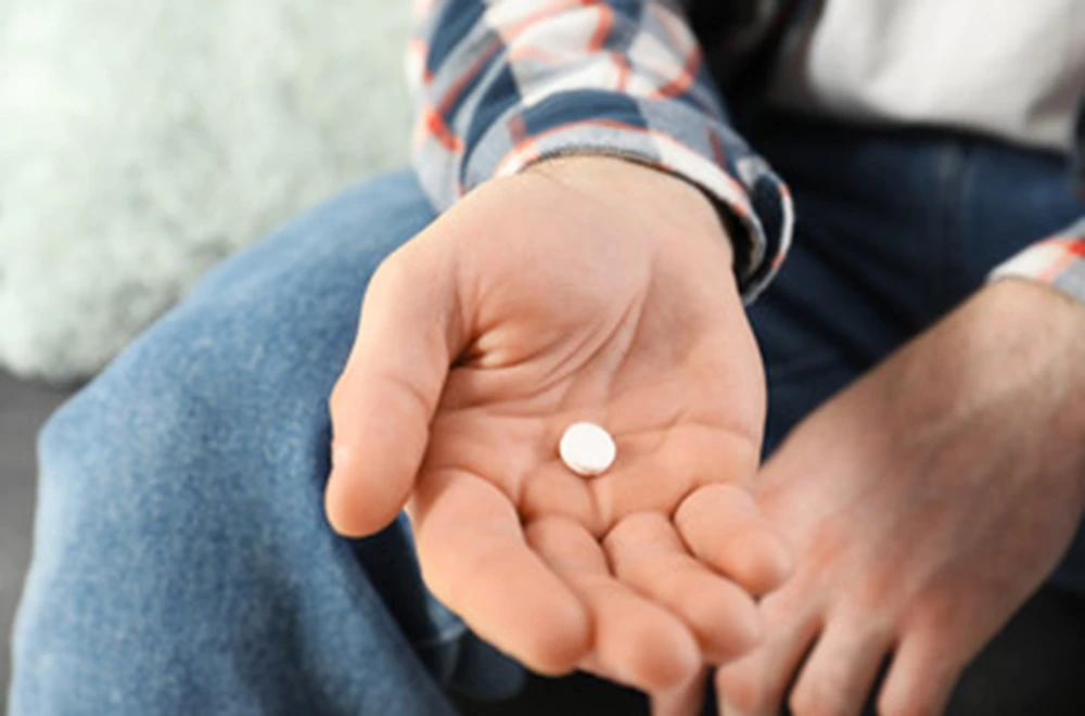 a pill in a hand